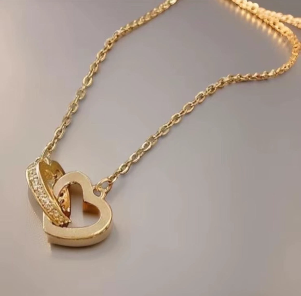 GOLD TWIN HEARTS NECKLACE
